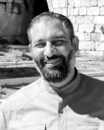 Ruhollah Bazghandi, FBI wanted notice photograph